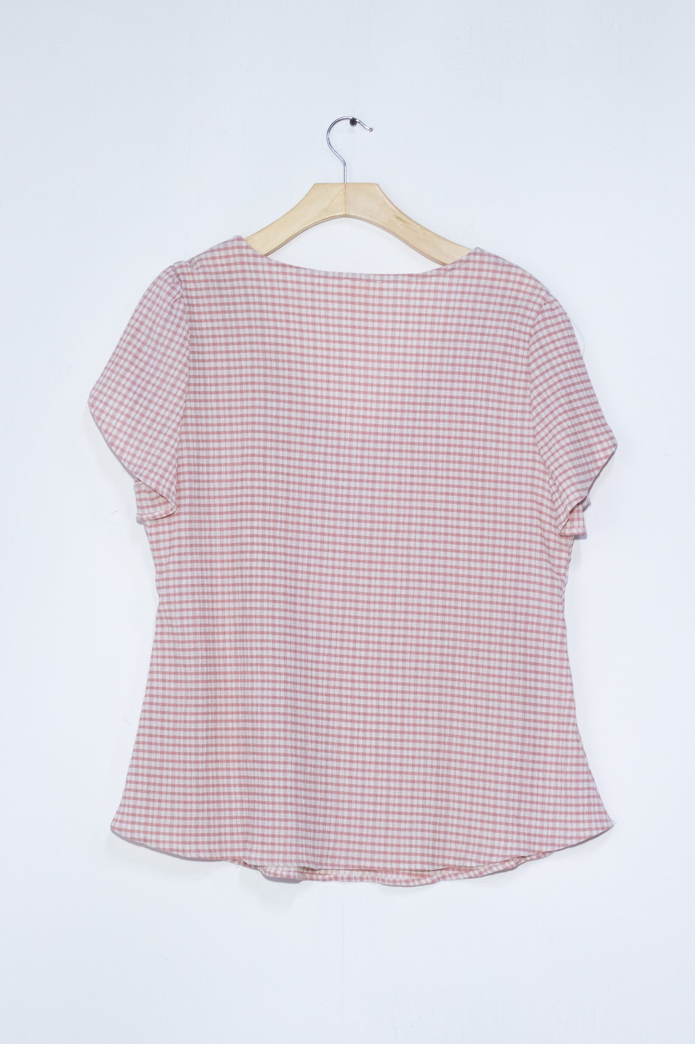 Blusa a cuadros rosa y negra