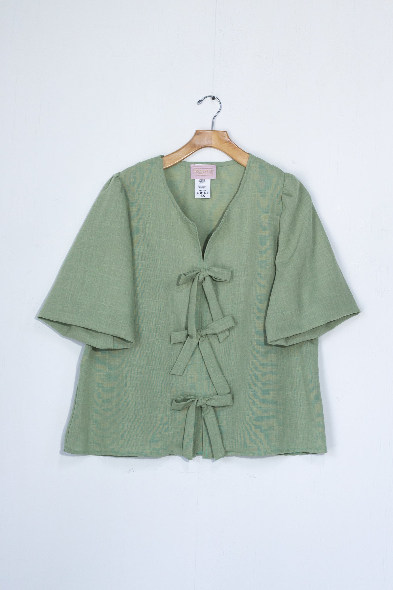 Blusa detalle moños