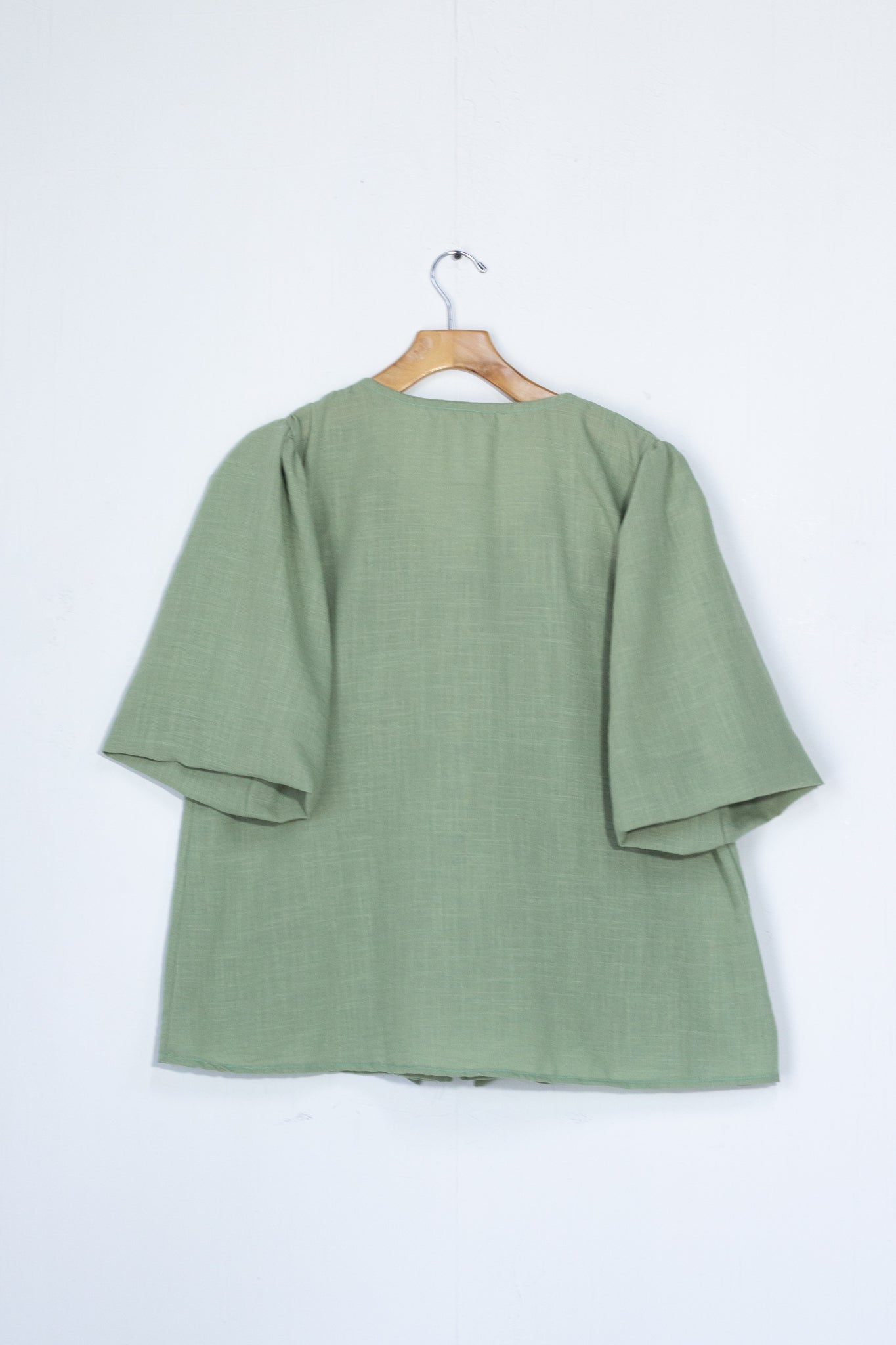 Blusa detalle moños