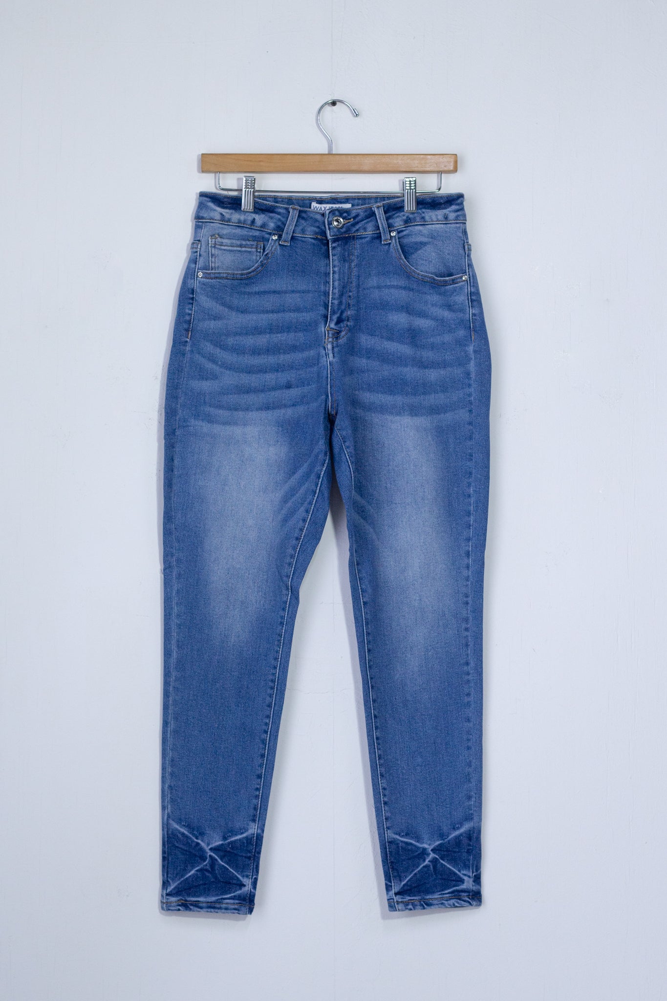 Light-colored skinny jeans