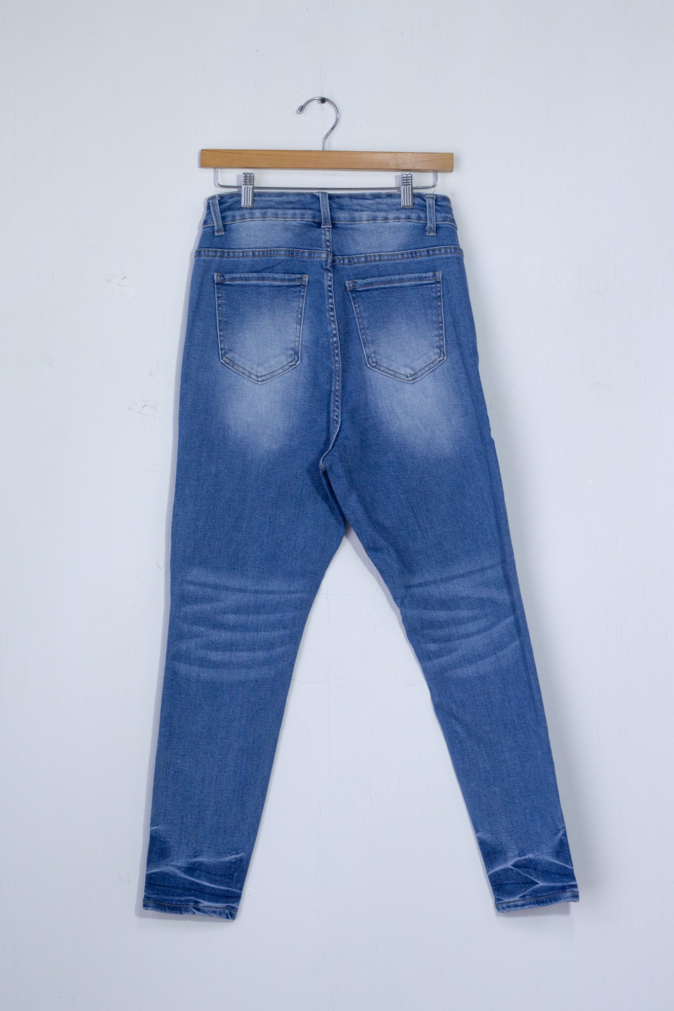 Light-colored skinny jeans