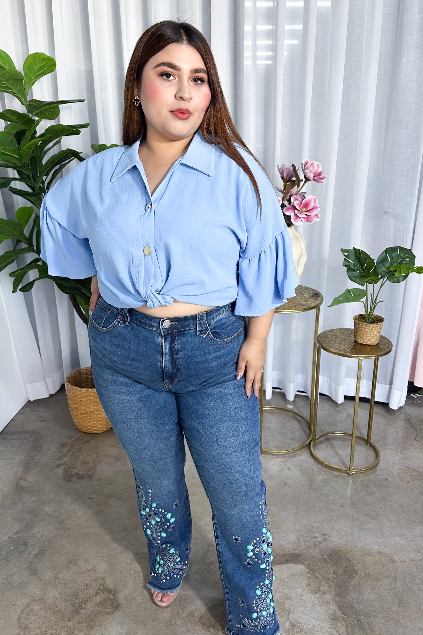 Jeans campana con aplicaciones