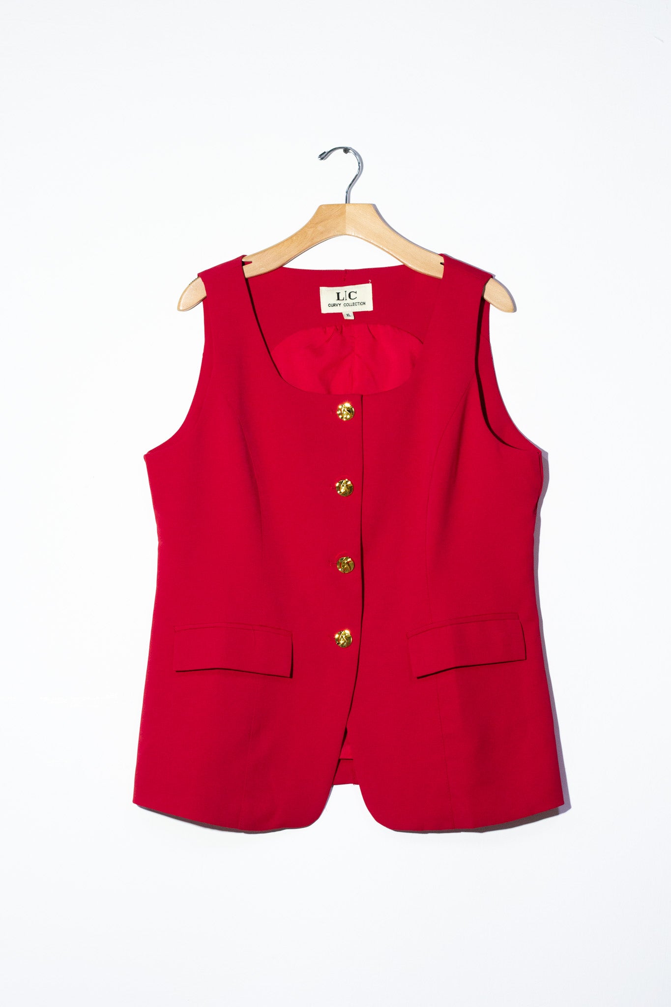 Chaleco liso con botones rojo