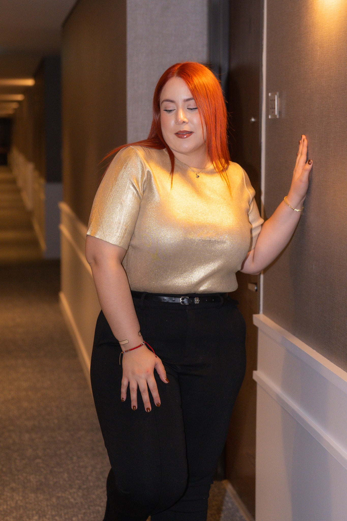 Blusa acanalada metalica dorada