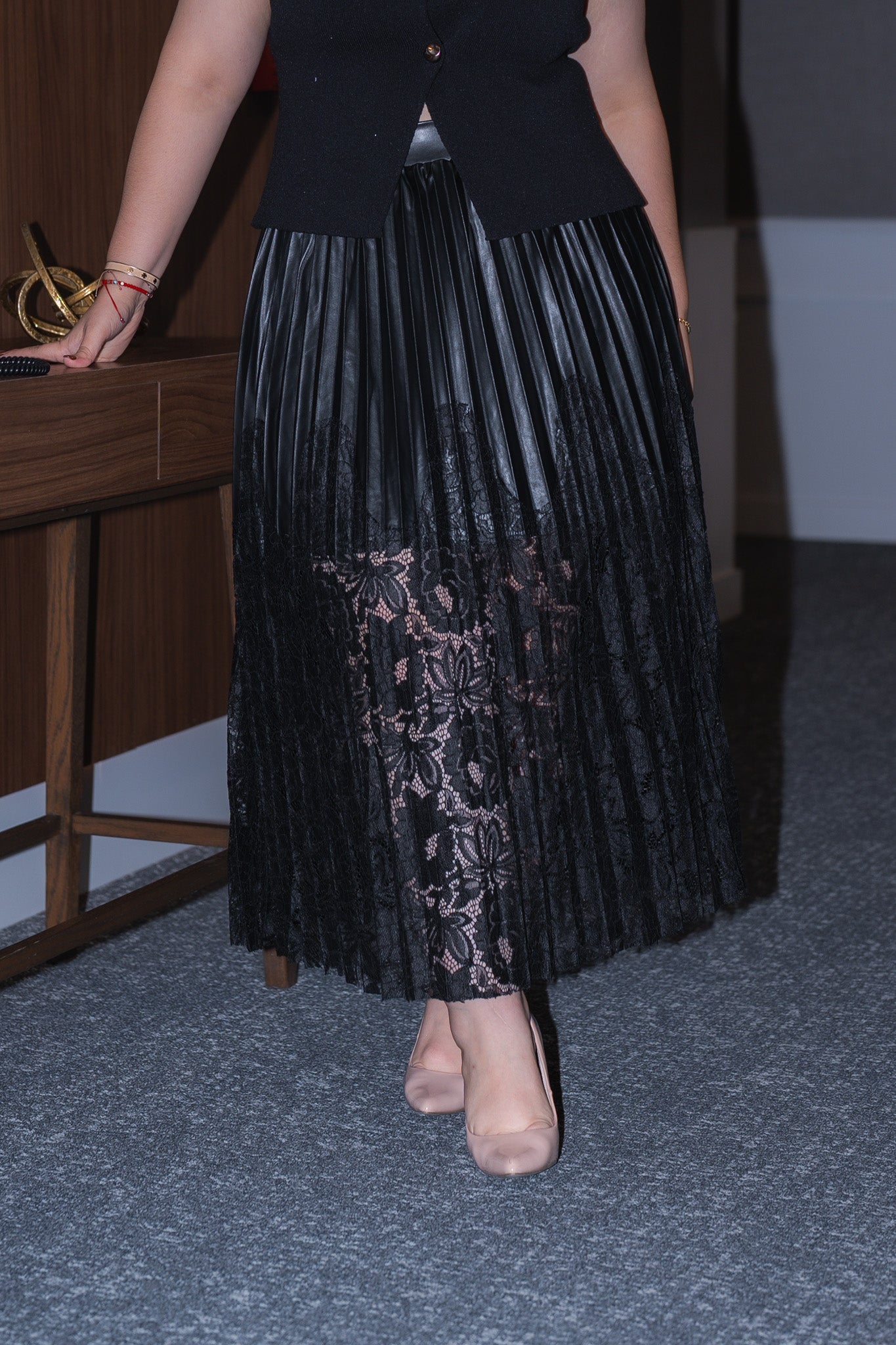 Falda plisada con encaje