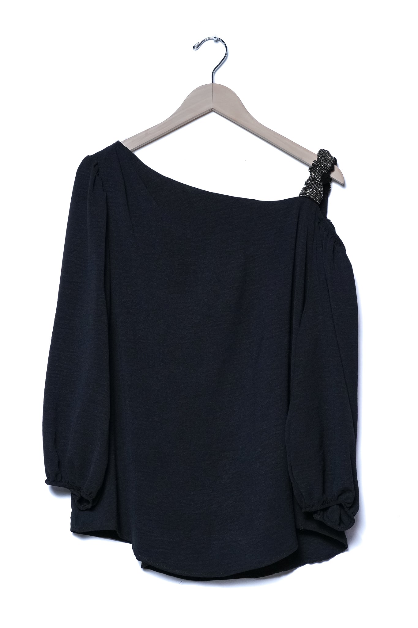 Blusa one shoulder con brillo negra