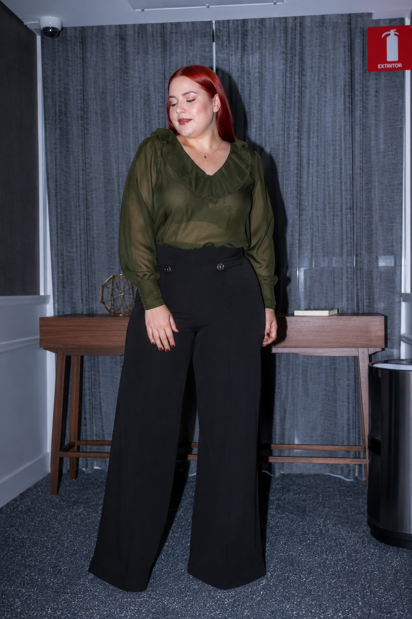 Blouse with black ruffle