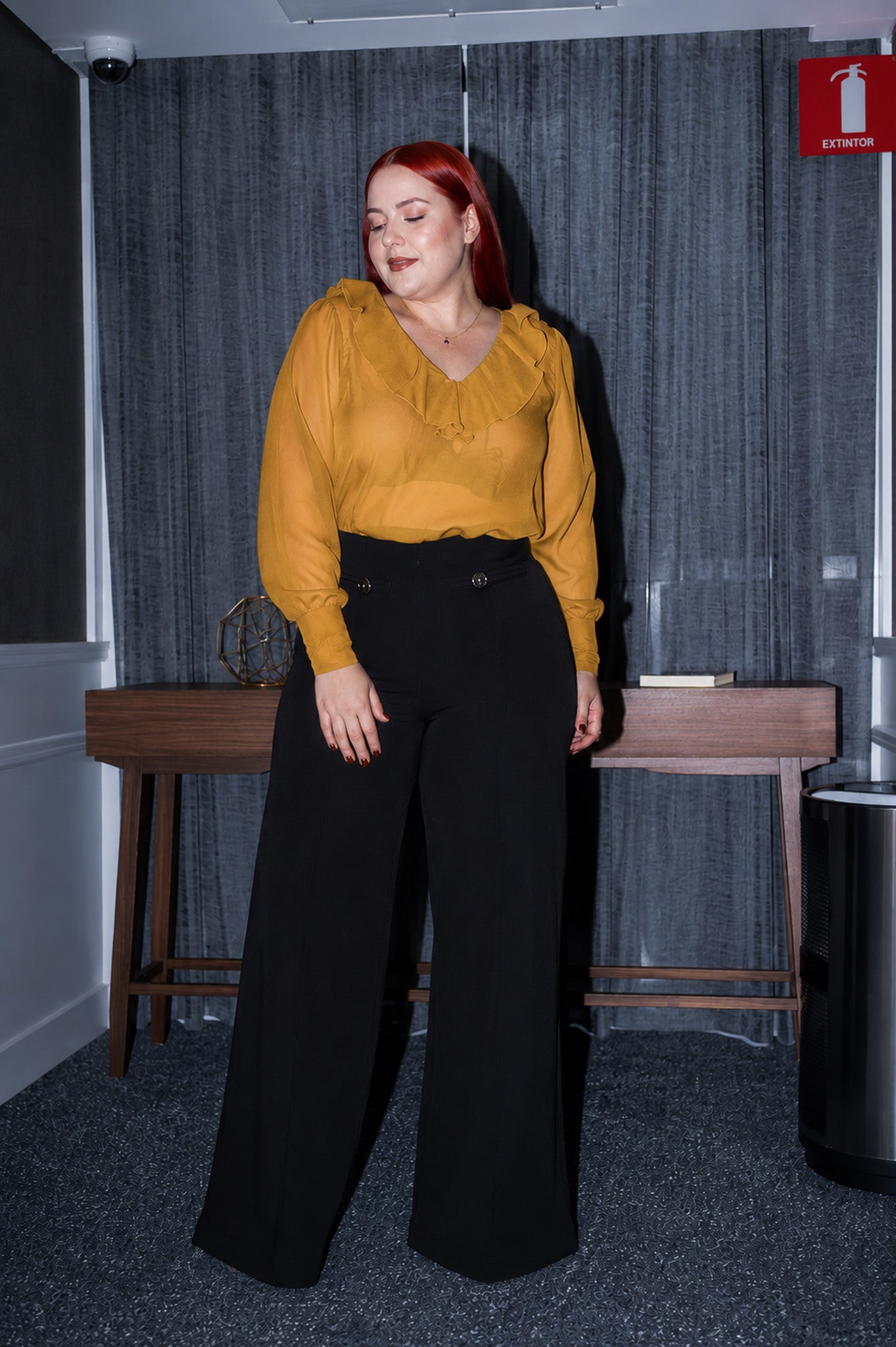 Blouse with black ruffle