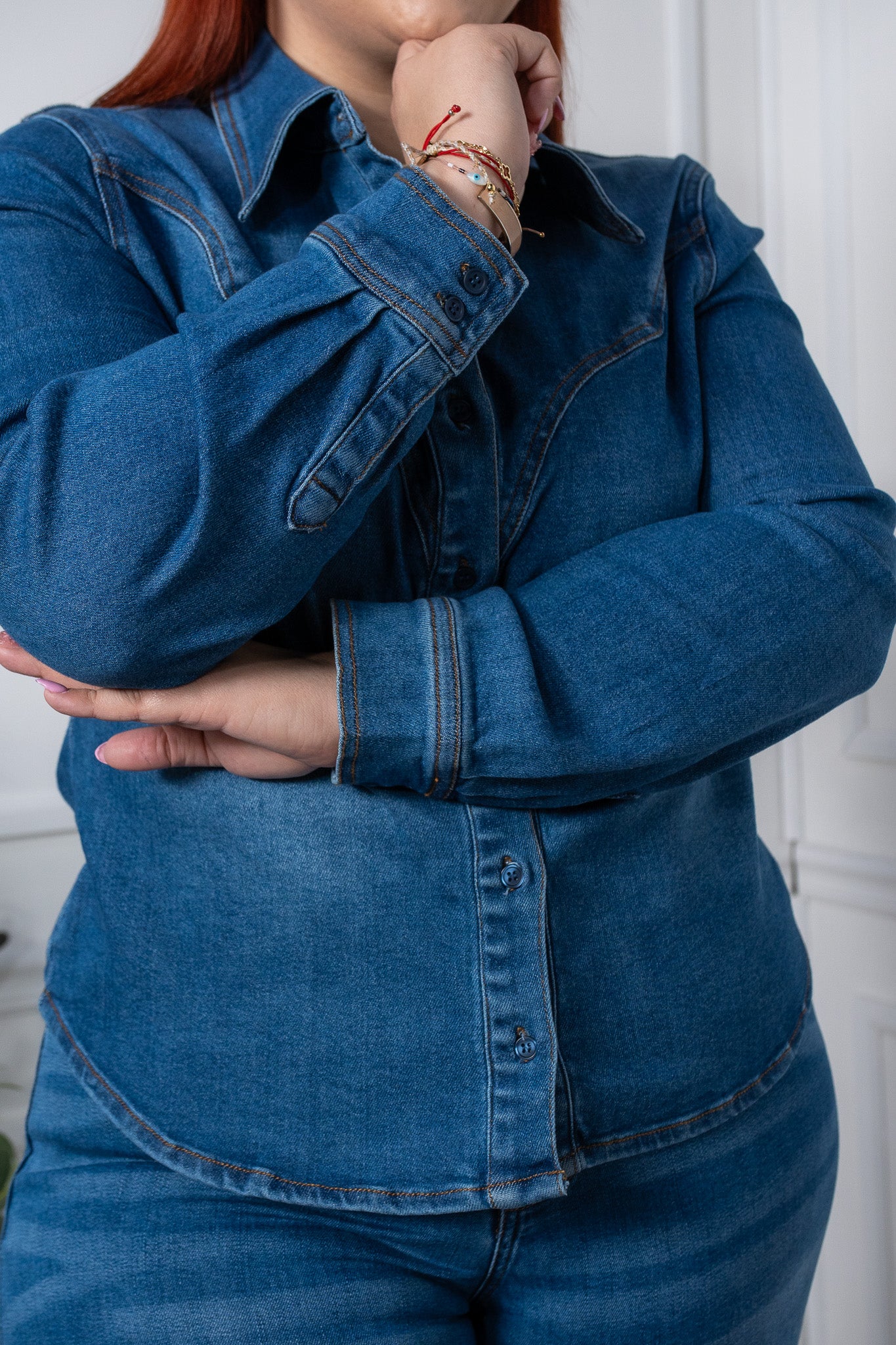 Denim shirt with dark pleats