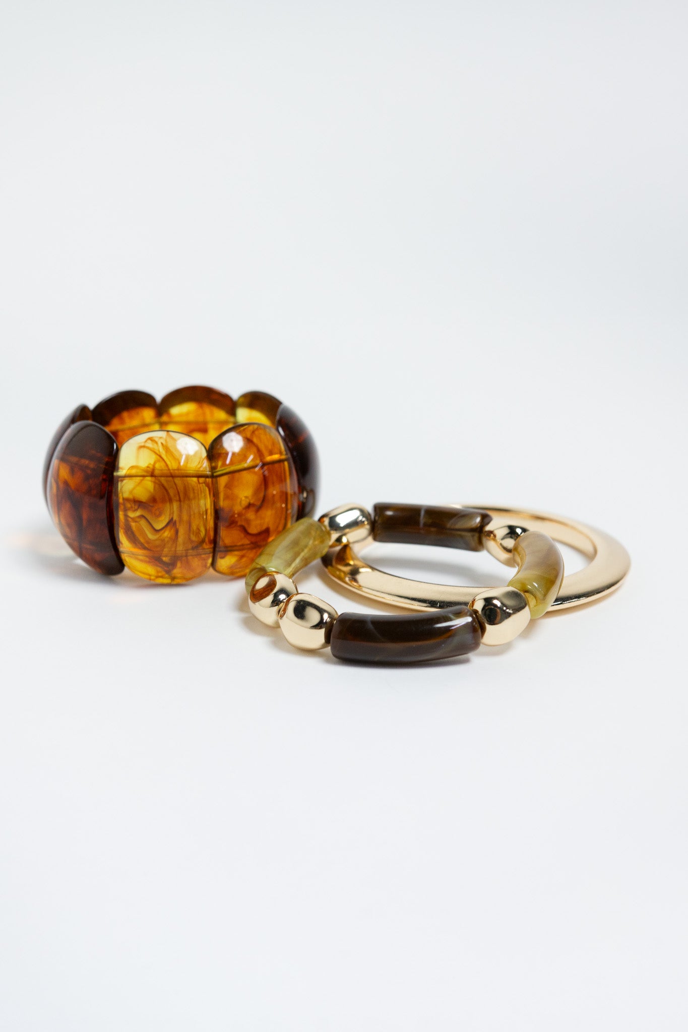 Set Tres Pulseras Acrilicas Carey Dorado