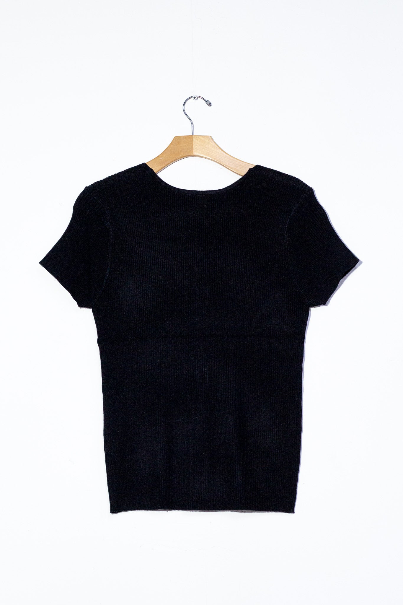 Blusa punto boton concha neg