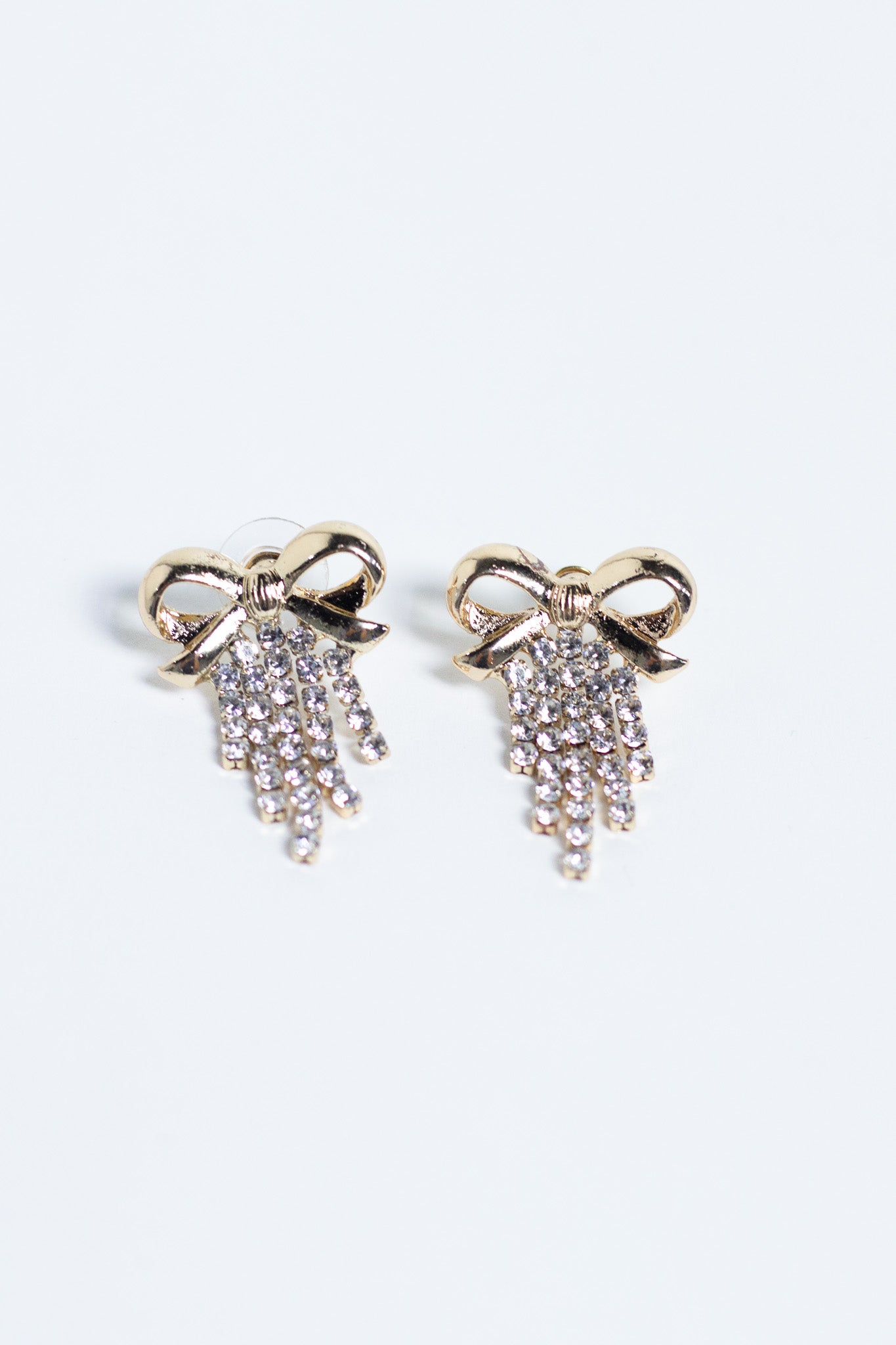 Aretes de Moño Curvy Dorados con Cascada de Cristales Brillantes