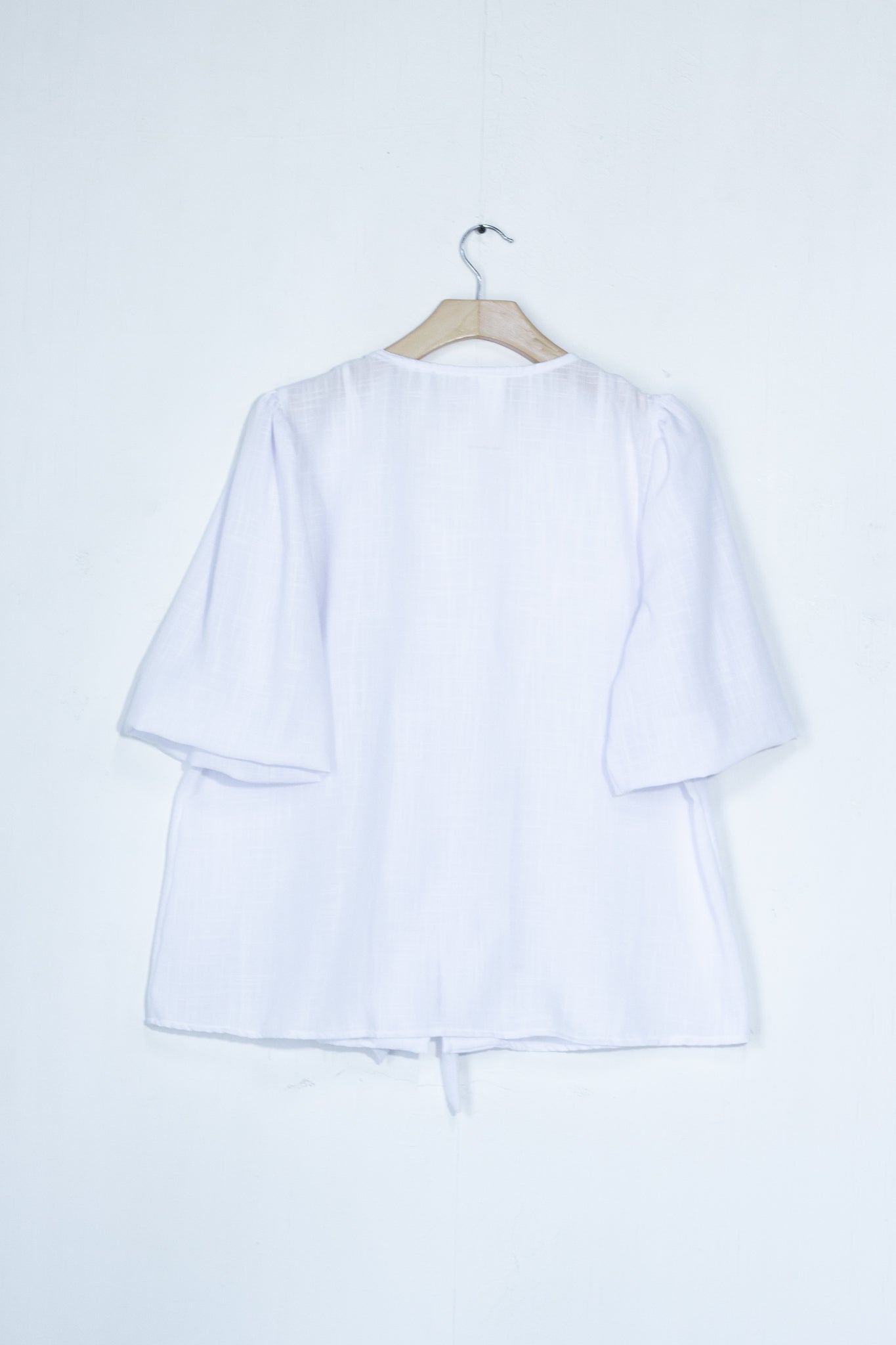 Blusa detalle moños