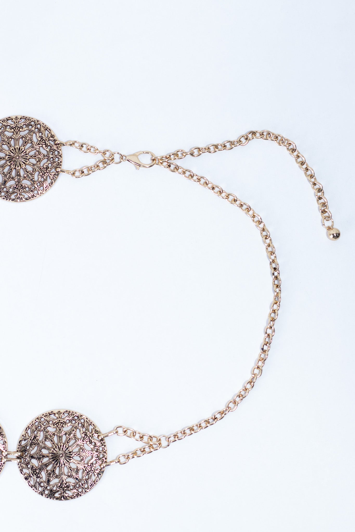 Cinto cadena círculos textura dorado