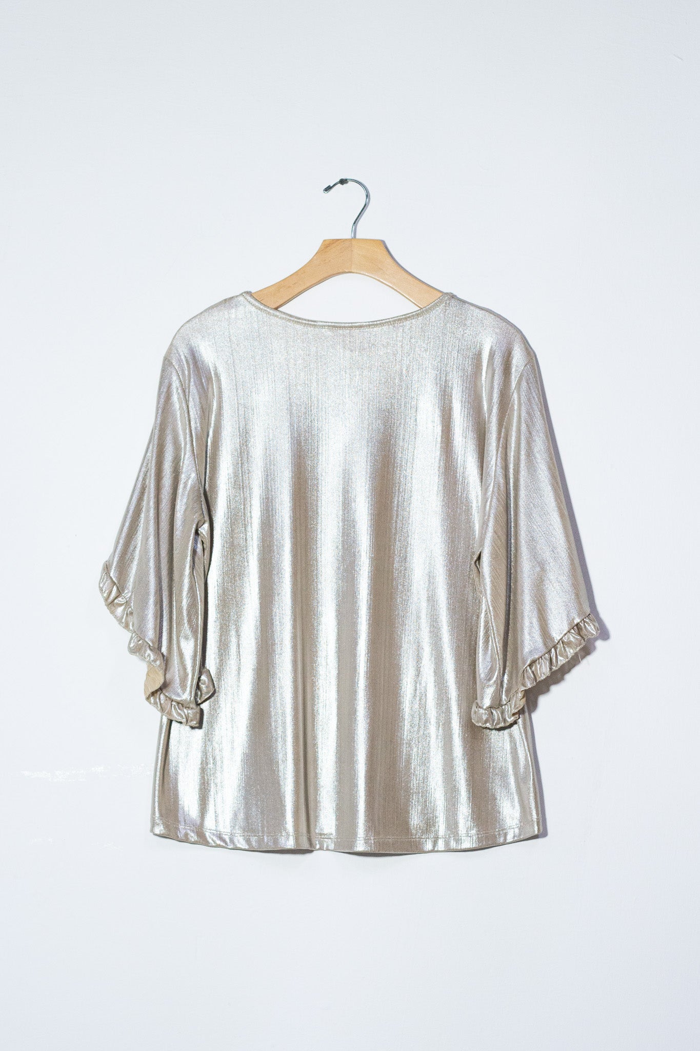 Blusa lisa metalica