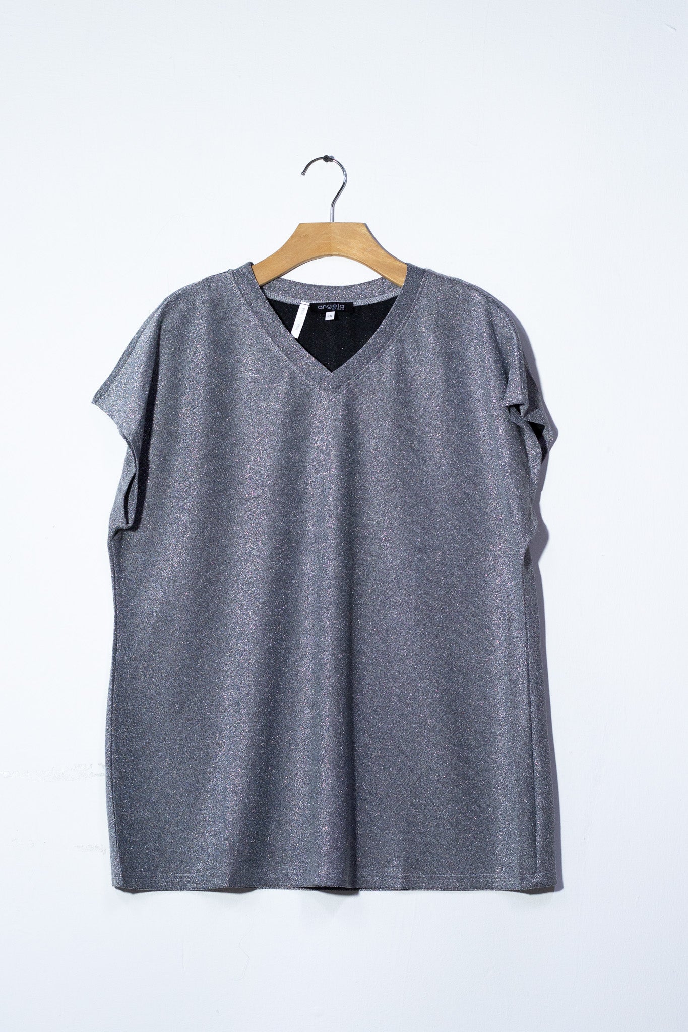 Blusa brillos plata