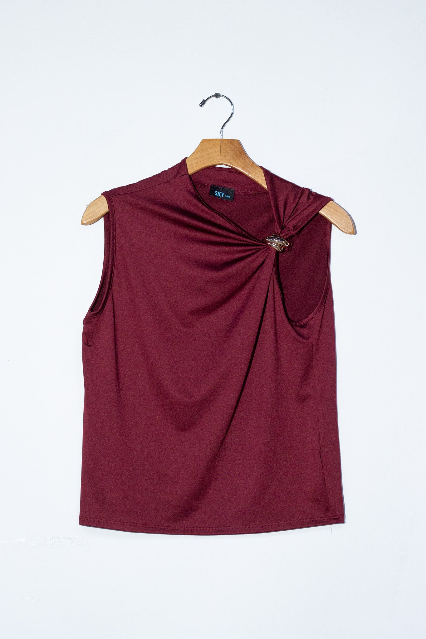 Blusa asimetrica c/detalle tinta
