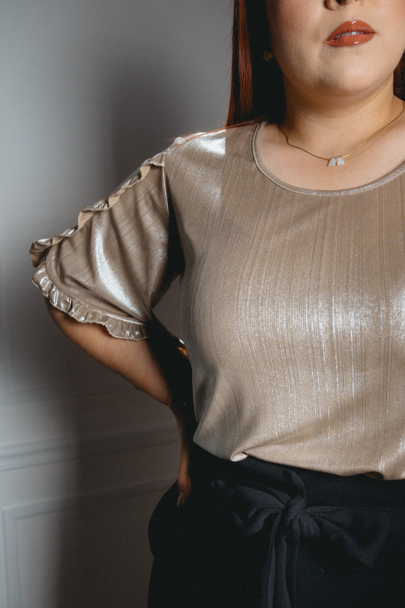 Blusa lisa metalica
