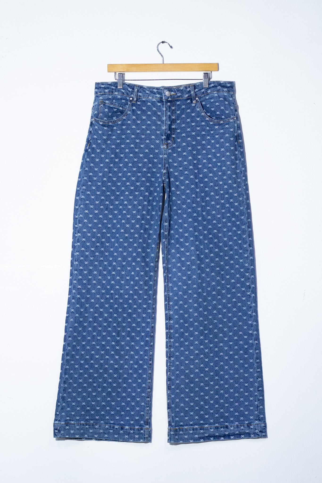 Jeans wide leg print moños cla