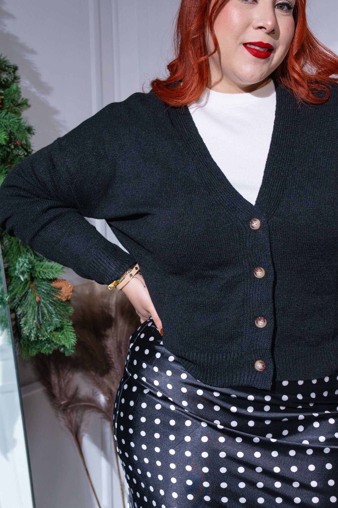 Sueter liso con botones negro