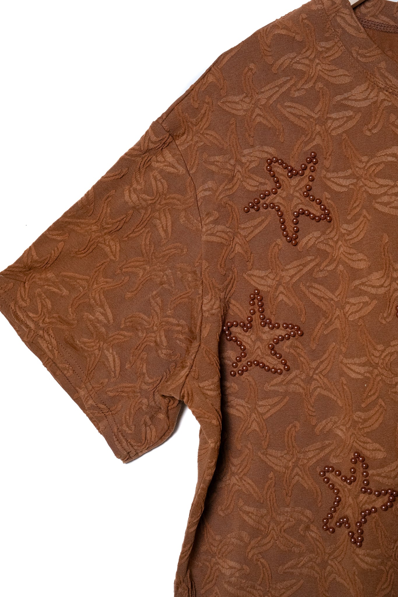 Blusa textura estrellas cafe