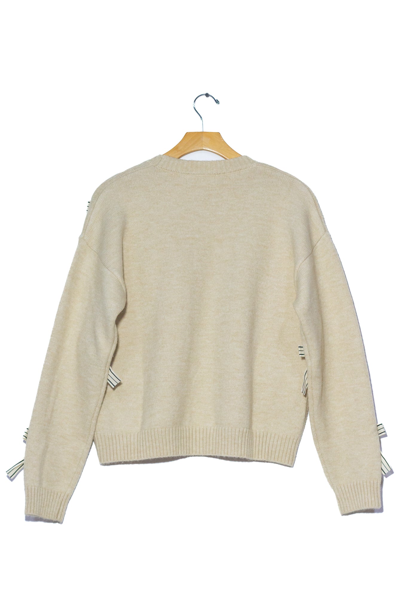 Suéter con moño beige