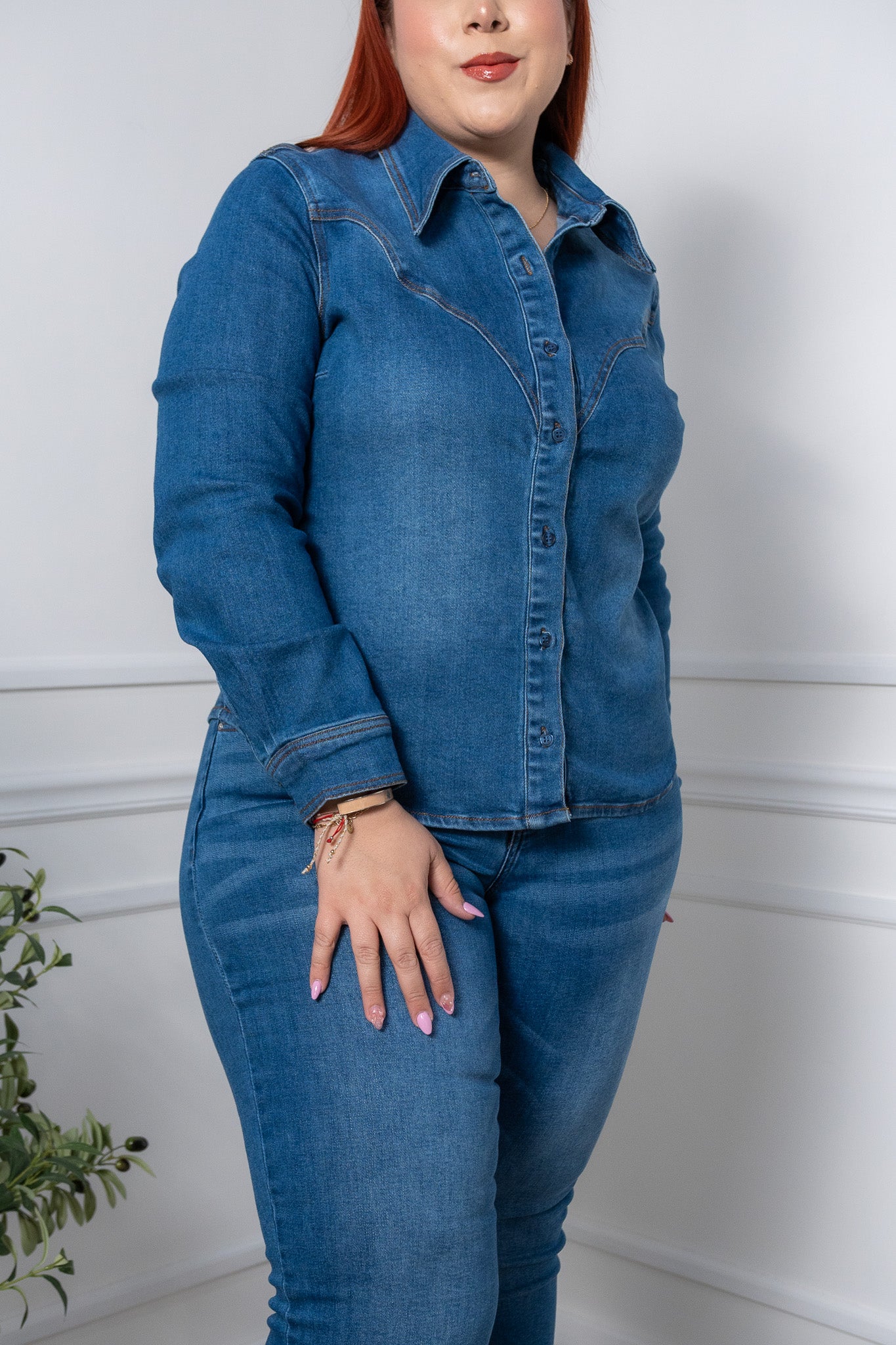 Denim shirt with dark pleats