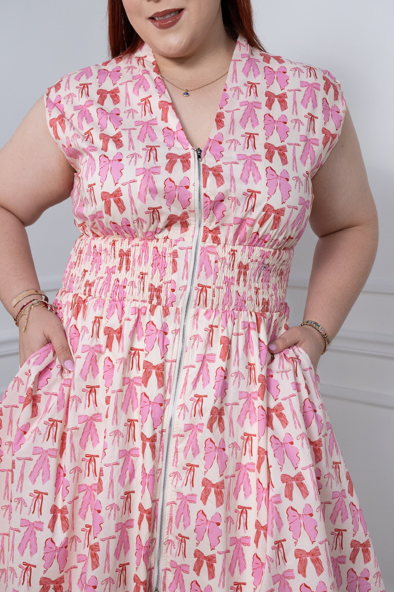 Pink bow print dress