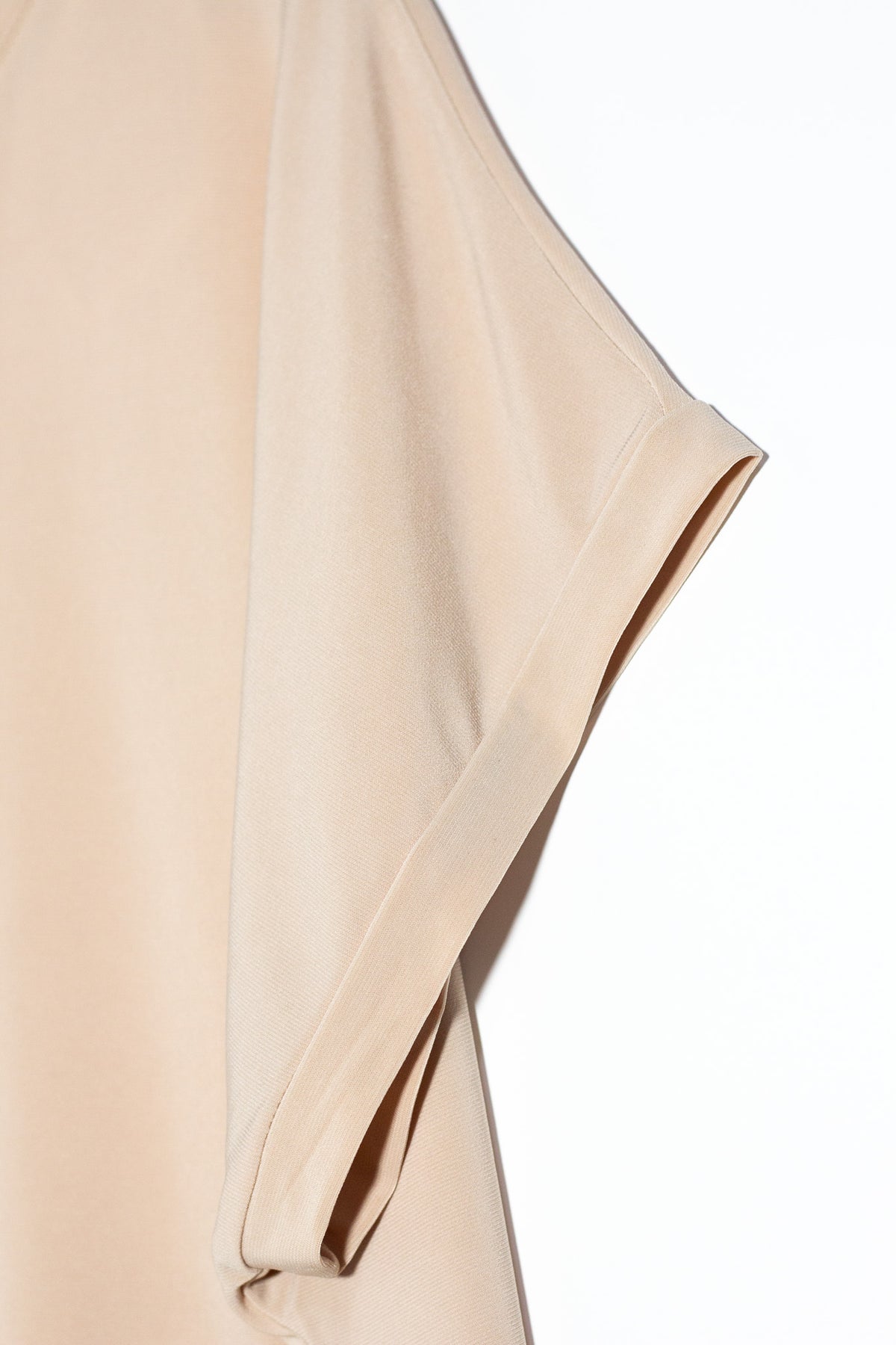 Blusa Curvy Licra Cuello Redondo Manga Corta Beige Oversize