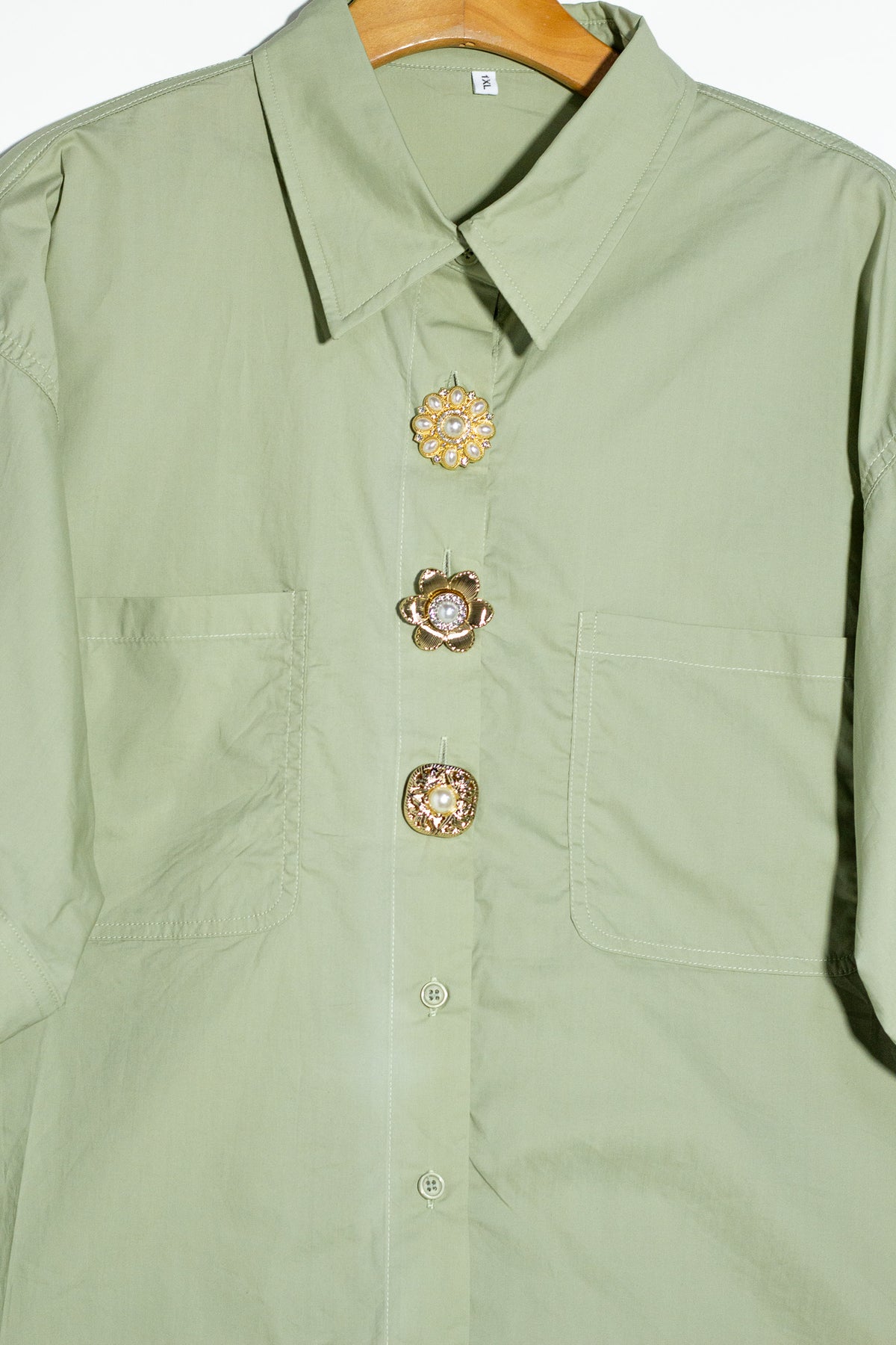 Camisa destalles botones verde
