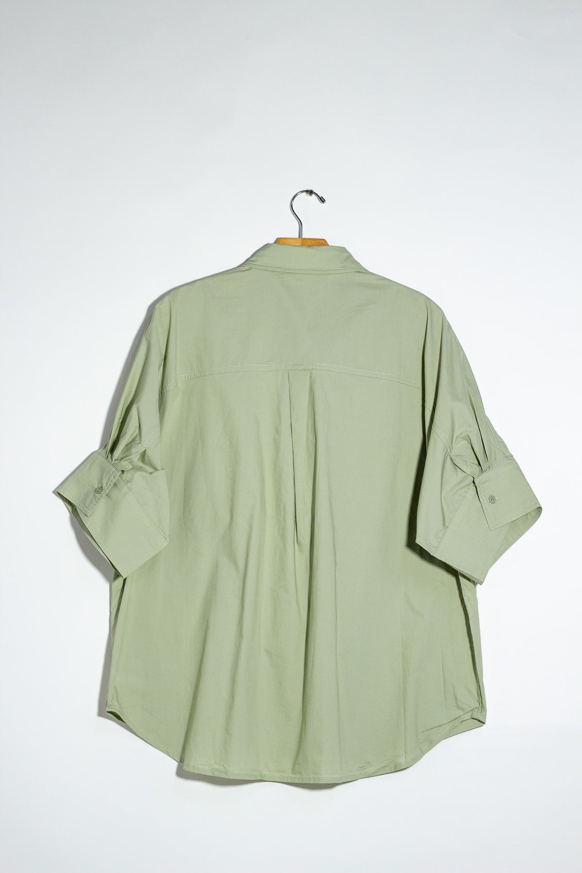 Camisa destalles botones verde