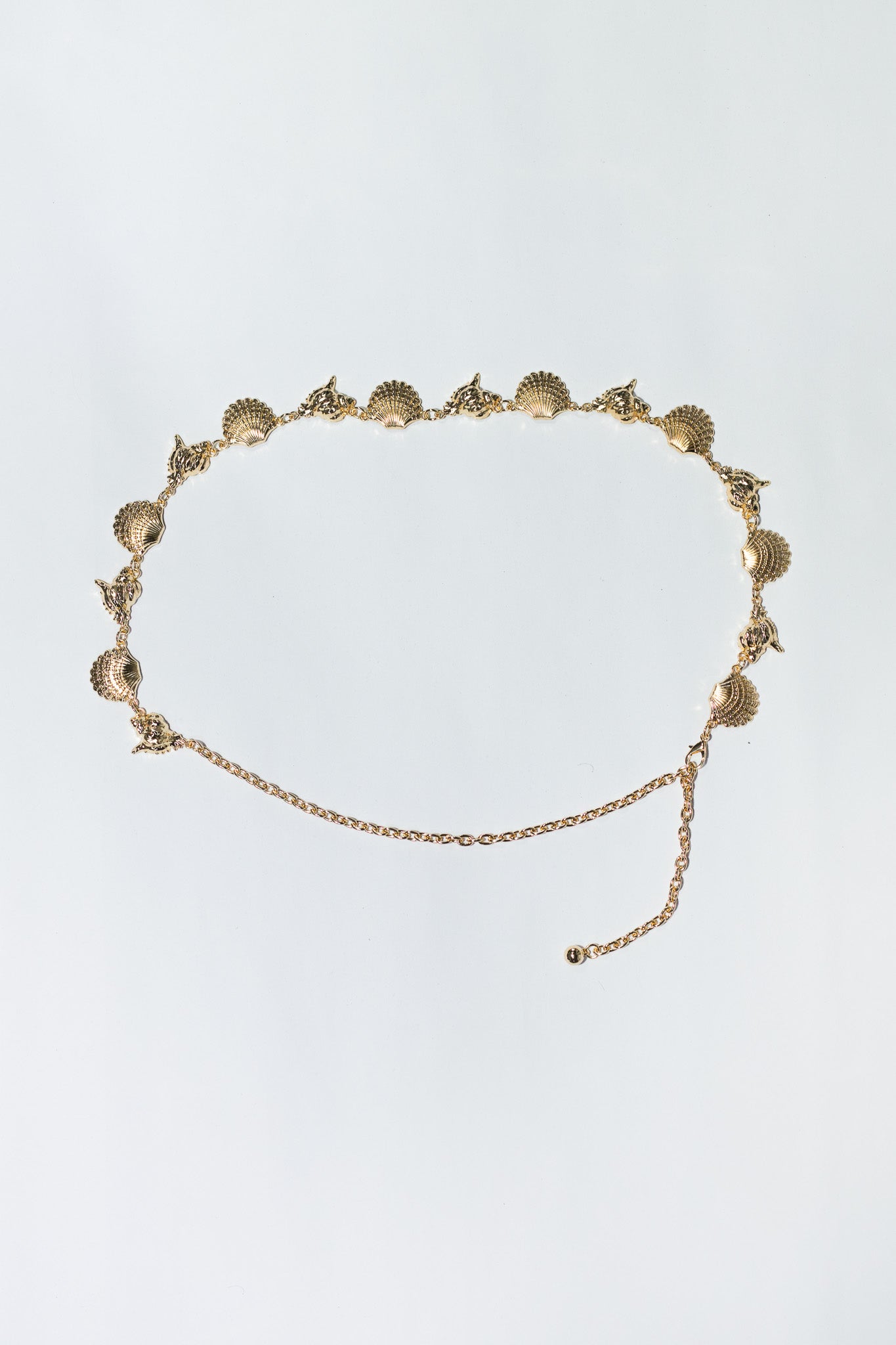 CINTO CADENA CARACOLES DORADO