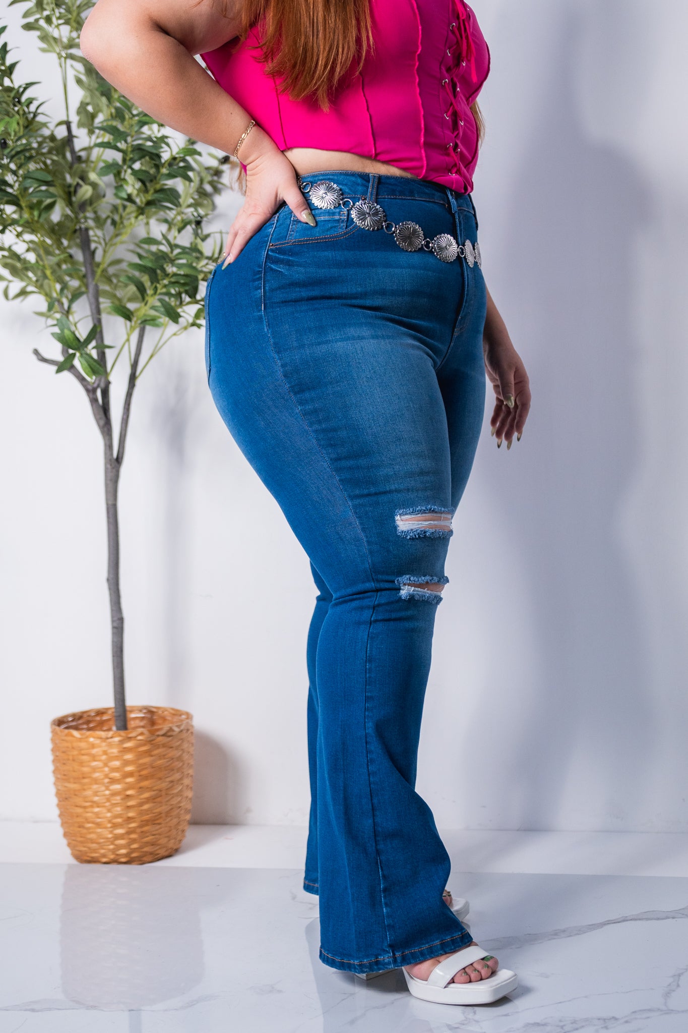 Jeans flare rasgado osc